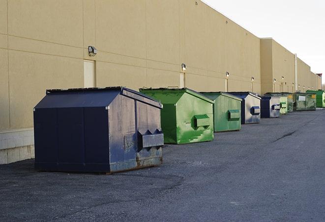 construction dumpsters stacked in a row on a job site in Cudahy